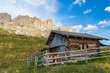 Traditional wooden hut in Dolomite Mountains at summer