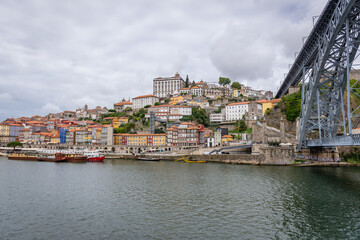 Poster - View from Douro River bank in Vila Nova de Gaia on Porto city, Portugal. Episcopal Palace in the middle