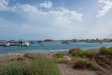 Wall Mural - Ionian Sea coast in Marzamemi village on the island of Sicily, Italy