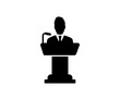 Conference speaker icon. Male person on podium symbol for public speech with microphone vector design and illustration.
