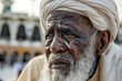 Elderly Muslim Man Reflecting in Mecca During Ramadan. Generative AI image