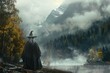 Wizard in medieval era forest with mountain and fog, fantasy and fiction concept.
