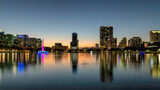 Fototapeta Miasta - Orlando city skyline at night. Panoramic view of Orlando  city in Lake Eola, Florida, USA