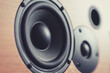 Sound column with black speaker close-up