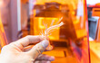 hand with object in shape of medically accurate a human blood vessel printed on 3d printer