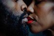 African-American man and woman kissing