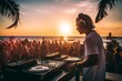 © Eomer2010 - Dj playing music at a beach party at sunset