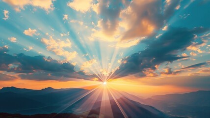 Wall Mural - Vivid sunrise over mountainous terrain with expansive clouds