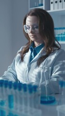 Aufkleber - A geneticist scientist using a computer and a microscope studies the structure and function of genes in a laboratory using molecular biology techniques. His research is helping to unravel cockroach