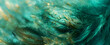 Close-up of light green and dark aquamarine feathers. Gold sprinkles with blurred edges, abstract background.