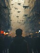 A person standing in a crowded city square, glancing nervously at drones hovering above, representing the invasion of privacy in a surveillance society Photography, Silhouette lighting,