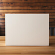 Blank white signboard hanging on a wooden wall. Mock up