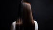 © Алла Морозова - A woman with long brown hair is standing in front of a black background