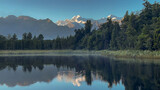 Fototapeta Natura - Scenic reflective lake Matheson on the West Coast of NZ