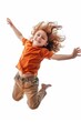 Child with a big smile captured mid-jump, showing a sense of freedom and happiness.