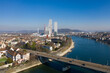 Basel, Switzerland: Aerial view of a bridge over the Rhine river in Basel city center with tall office towers in Switzerland