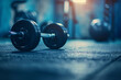 Dumbbell used in weight training on gym floor
