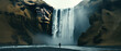 A cinematic photo of Skogafoss in Iceland, waterfall with water pouring down the cliffside, a person standing at its base looking up into it.