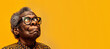 Elderly African American black woman wearing glasses, looking up to copy space on side. Studio banner. Generative AI