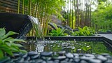 Fototapeta  - serene water garden including a bamboo water fountain.