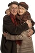 Senior man and woman hugging each other, conveying affection and lifelong partnership.