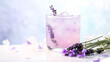 Lavender cocktail with lavender flowers on table. Generative ai design.