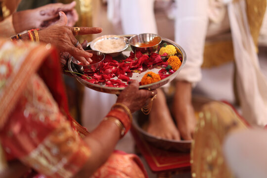 A Women offering flowers to Worship God in Hindu Wedding Ritual | Hindu Wedding Ceremony Background