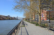 East River Waterfront Walking Line, Manhattan, with Roosevelt Island and Queensboro Bridge in background. New York City