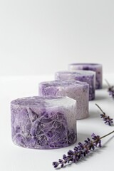Poster - Three soap bars neatly arranged on a table, suitable for hygiene or household concepts
