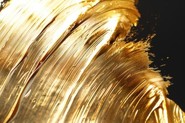 Aufkleber - Close up shot of gold paint on black background, suitable for luxury or elegant design projects