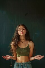 Poster - A woman with long hair wearing a green crop top