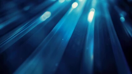 Poster - A blurred image showcasing a vibrant blue light source. Ideal for design projects or digital art concepts.