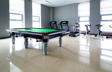 Canvas Print - The pool table is indoors