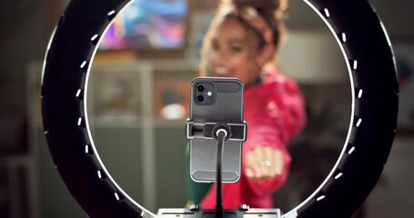 Leinwandbilder - Influencer, phone and woman dance for live streaming audience on social media, mobile app and website. Night, home and person with ring light record on smartphone for tutorial, networking and vlog