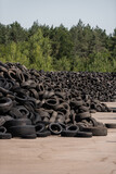 Fototapeta  - used car tires - waste that can be recycled - pile of used tires