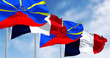 Reunion and national french flags waving in the wind on a clear day