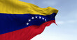 Close-up of Venezuela national flag waving on a clear day