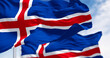 Close-up of two Iceland national flags waving