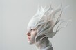Elegant Woman with White Hair Wearing Artistic Headpiece Made of Plastic and White Paint