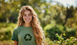 © anatoliycherkas - Young smiling attractive woman in gray t-shirt with recycle symbol in park
