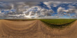 360 hdri panorama view on no traffic gravel road among fields in spring day with beautiful clouds in equirectangular full seamless spherical projection, ready for VR AR