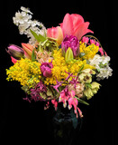 Fototapeta  - Romantic bouquet of the first garden flowers