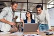 © InsideCreativeHouse - Team of three businesspeople discussing future plans in meeting. Business team working together in office. Support and brainstorming, multitasking for a startup results development