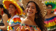 Woman in vibrant traditional Mexican attire smiling.