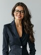 © Johannes - Portrait of happy woman looks in camera. Beautiful business woman professional in a suit at isolated background.