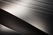 An abstract metal background characterized by sleek, brushed steel surfaces with hints of polished chrome