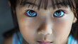 A realistic close-up that captures the beauty and magic of a little Asian girl's eyes, conveying their expressiveness and mystery.