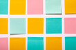 © Tetra Images - Rows of colorful blank adhesive notes on white background