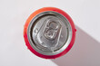 © Tetra Images - Overhead view of can of soda on white background