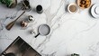 A birdseye view of a designer kitchen with a sleek marble countertop filled with various dishes and utensils